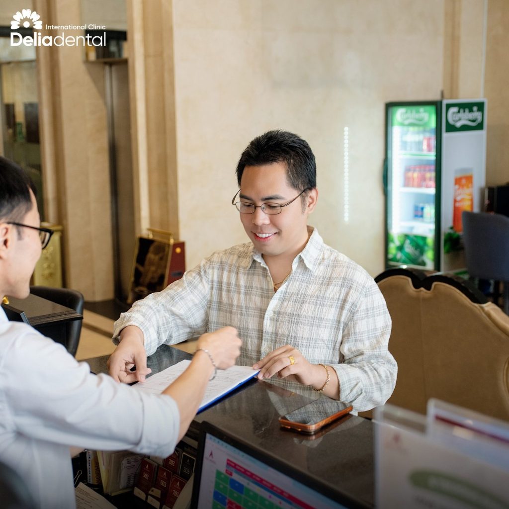 Check-in at Hanoi hotel before dental treatment in Vietnam
