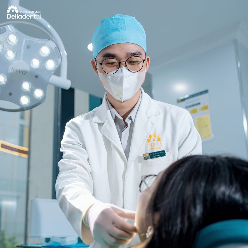 Doctor doing check-up at Delia Dental Clinic